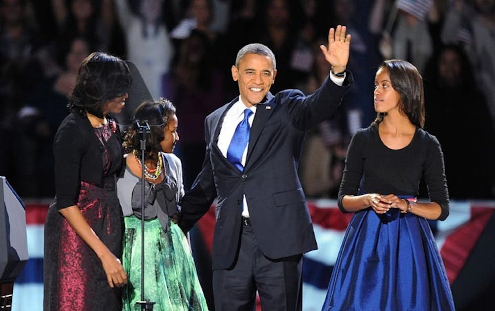 President Barack Obama and the first family take the stage Tuesday, November 6, 2012, in Chicago, Illinois, after the president was re-elected. (Olivier Douliery/Abaca Press/MCT)