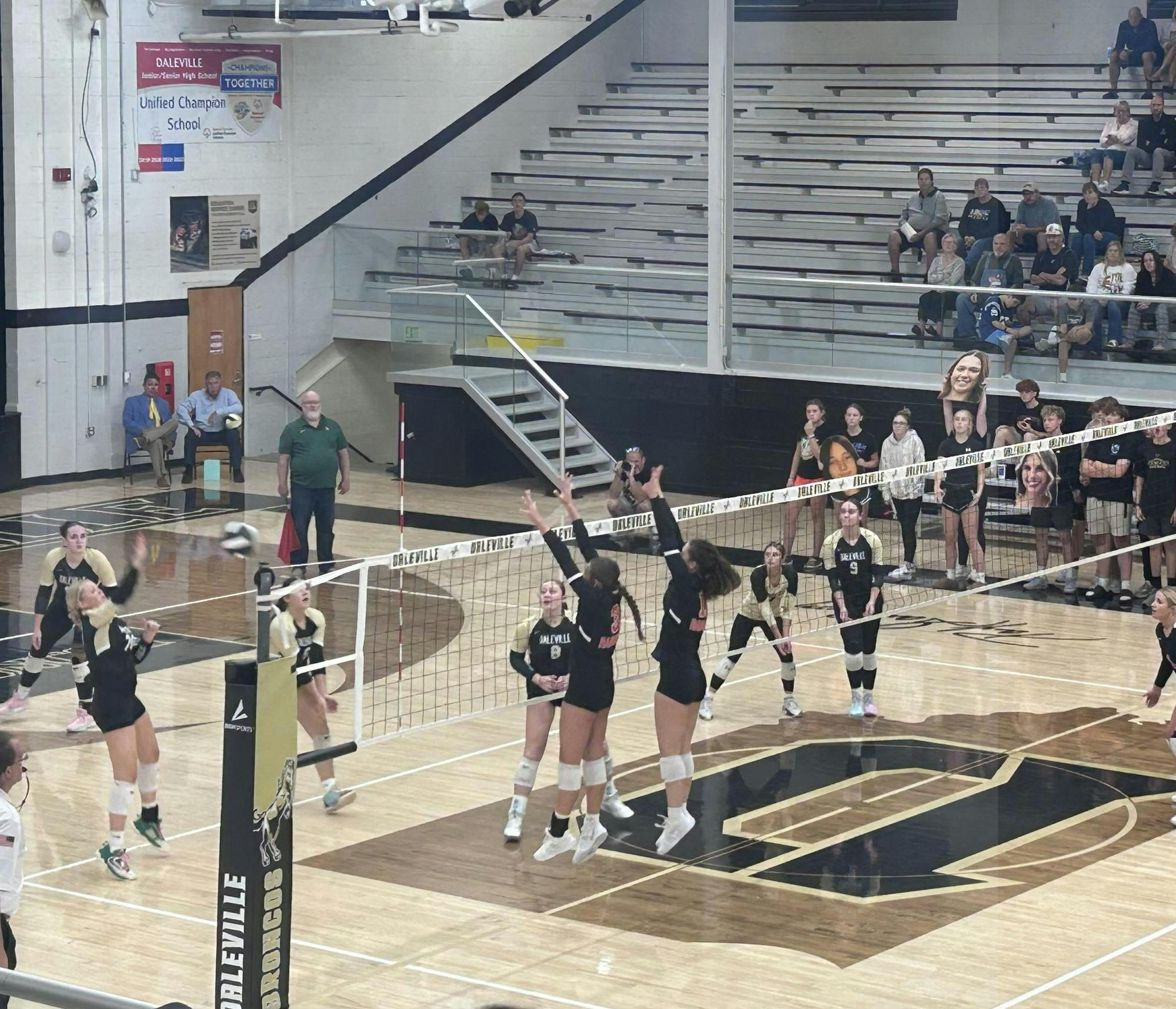 Marin Hopkins (#3) and Olivia Walters (#11) go up to block, as the Raiders win 3-0. Photo by Kenna Geibel
