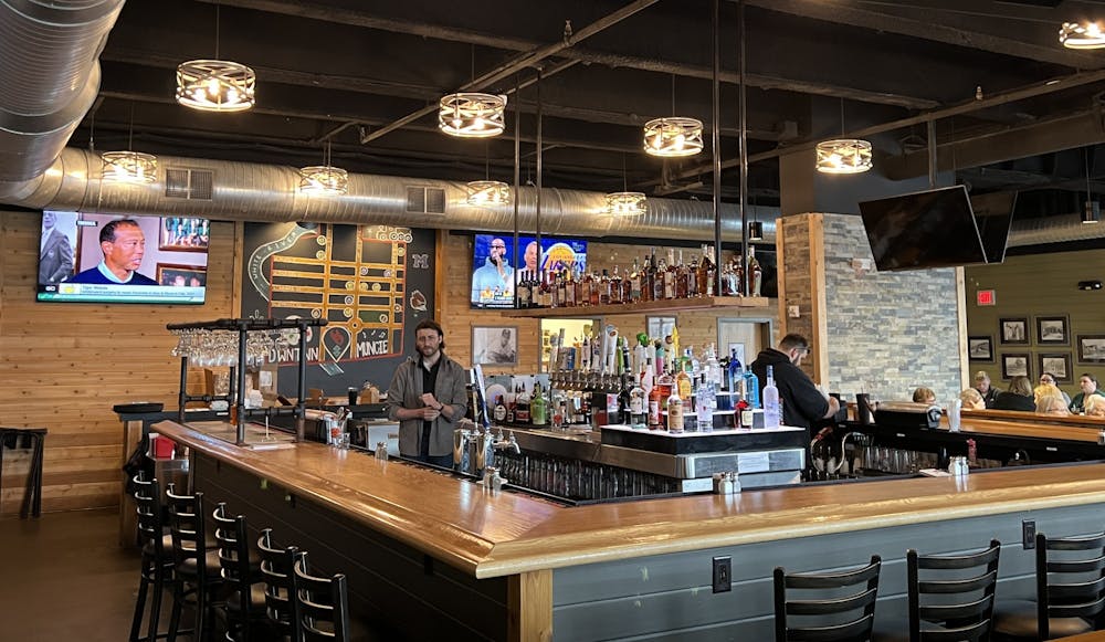 Bartenders work at 1925 PubHouse April 6 in Downtown Muncie. The restaurant features a wrap around bar as well as indoor and outdoor seating. Rylan Capper, DN 