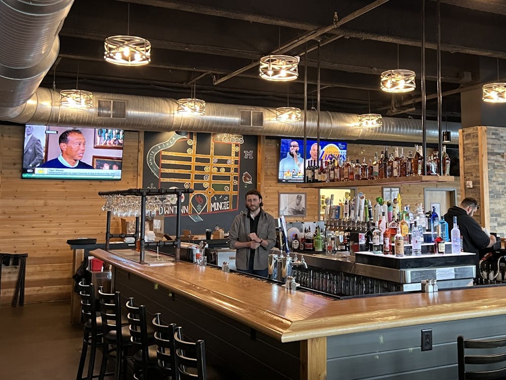 Bartenders work at 1925 PubHouse April 6 in Downtown Muncie. The restaurant features a wrap around bar as well as indoor and outdoor seating. Rylan Capper, DN 