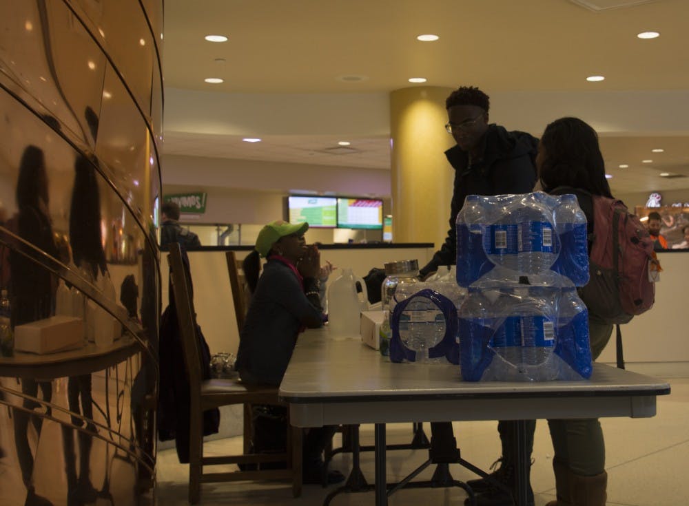 <p>The Black Student Association organized a water drive called #FreshWaterWednesday to help the city of Flint, Mich. After switching from Detroit to Flint River water, the city now has lead contaminated water. <em>DN PHOTO SAMANTHA BRAMMER</em></p>