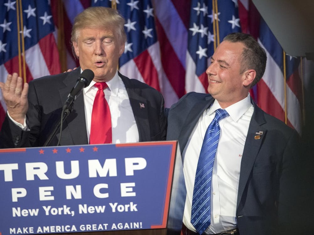 President-elect Donald Trump acknowledges the chairman of the RNC, Reince Priebus, while talking to supporters at the Election Night Party at the Hilton Midtown Hotel in New York City on Wednesday, Nov. 9, 2016. (J. Conrad Williams Jr./Newsday/TNS)