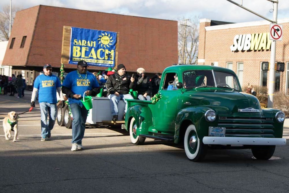<p>Participants walk and ride down Walnut Street March 16, 2019, for St. Patrick's Day celebrations. The 2020 St. Patrick's Day parade in Muncie has been postponed due to COVID-19 concerns. <strong>Kamryn Tomlinson, DN File</strong></p>