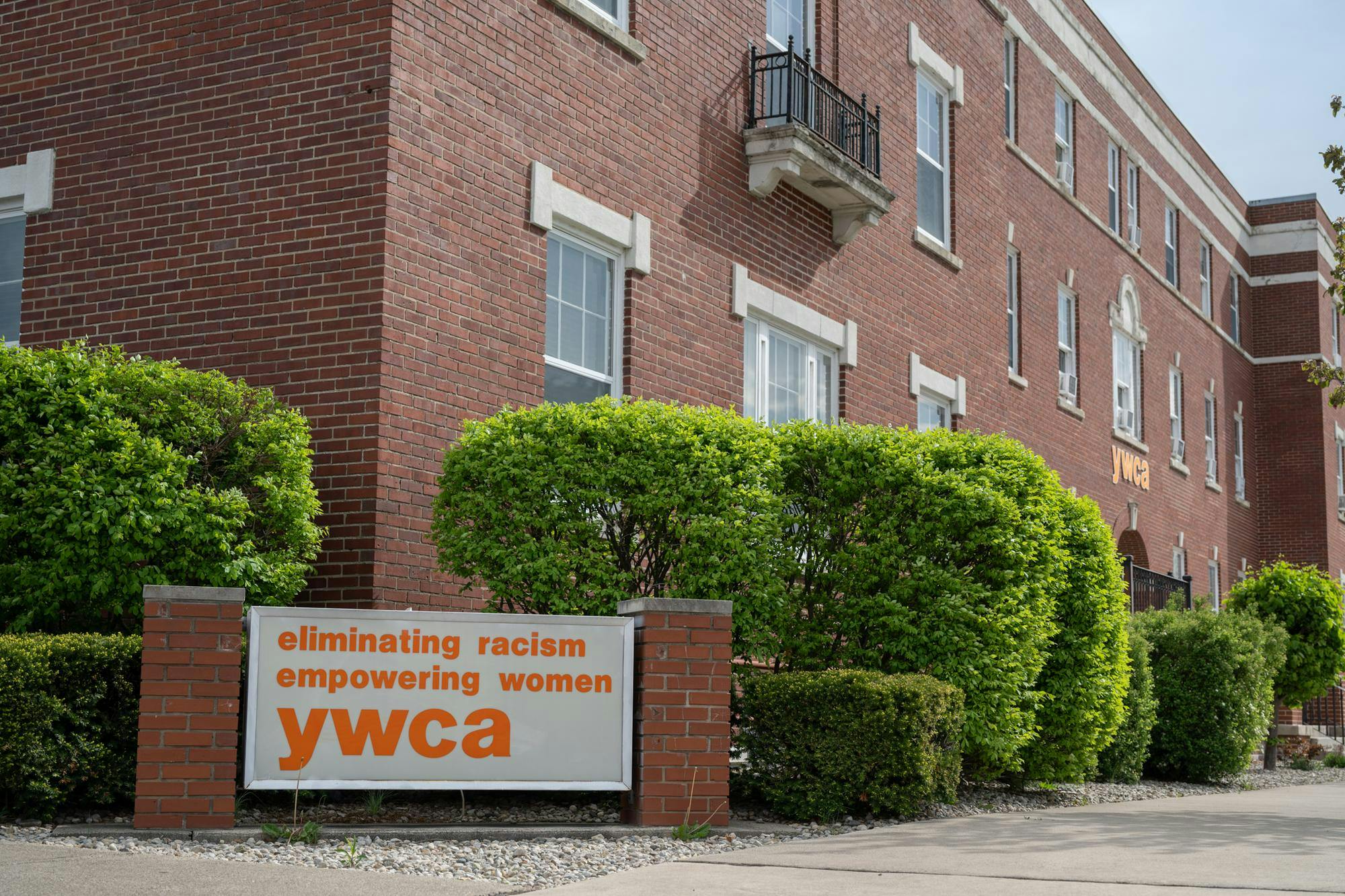 The exterior corner of the Muncie YWCA building pictured April 14 in downtown Muncie. The YWCA offers emergency shelter for women and children experiencing domestic abuse situations, housing insecurity and more. Ryan Fleek, DN