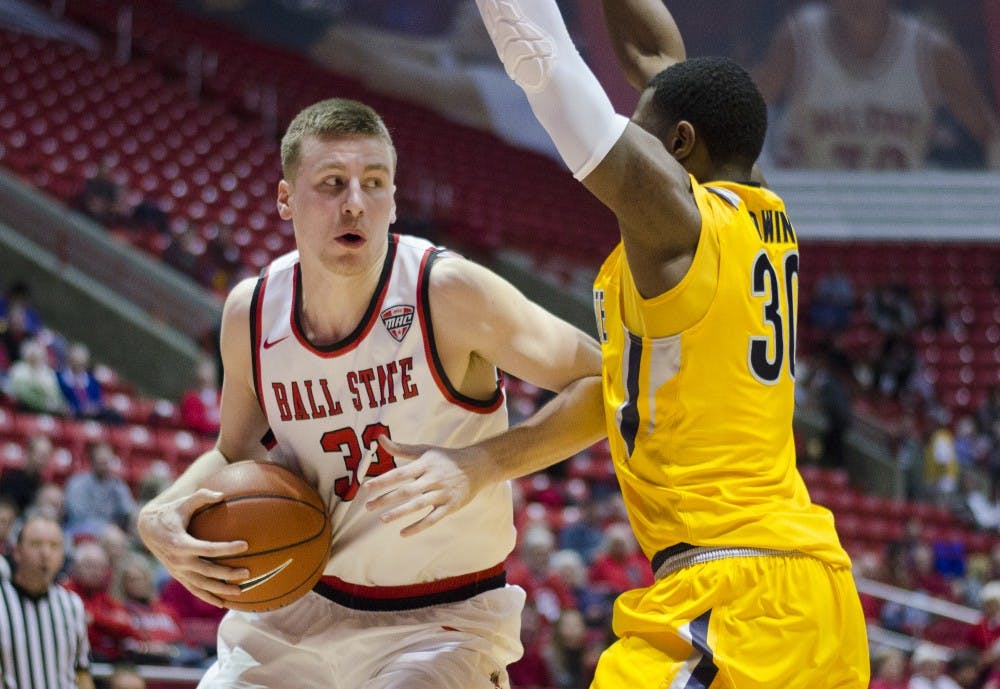 Junior guard Ryan Weber attempts to get past a Kent State player during the game against Kent State on Jan. 19 at Worthen Arena. DN PHOTO BREANNA DAUGHERTY