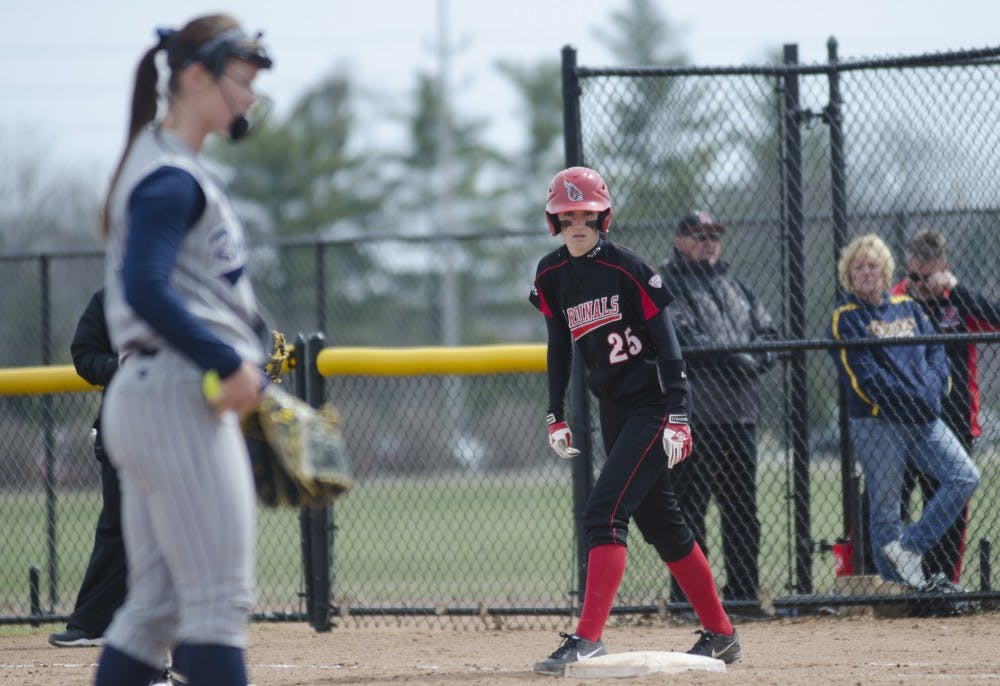 Senior Jennifer Gilbert watches the pitcher before trying to steal second base against Toledo on April 6 at the Ball State Softball Complex. DN PHOTO BREANNA DAUGHERTY