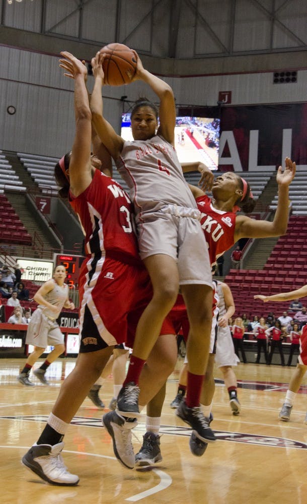 Sophomore guard Nathalie Fontaine jumps up to get a rebound in the first half of the game against Western Kentucky on Dec. 7 at Worthen Arena. DN PHOTO BREANNA DAUGHERTY 
