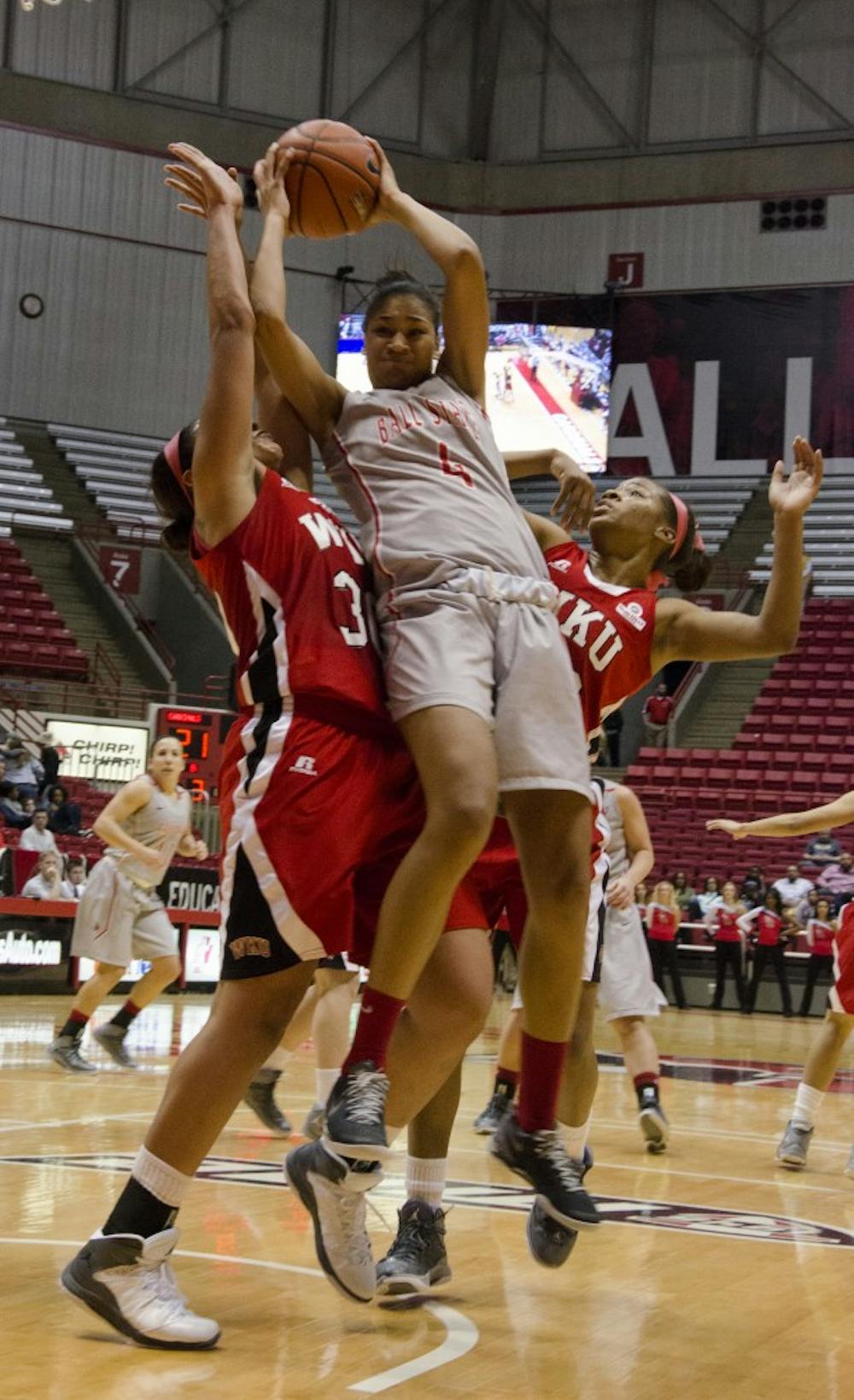 Sophomore guard Nathalie Fontaine jumps up to get a rebound in the first half of the game against Western Kentucky on Dec. 7 at Worthen Arena. DN PHOTO BREANNA DAUGHERTY 