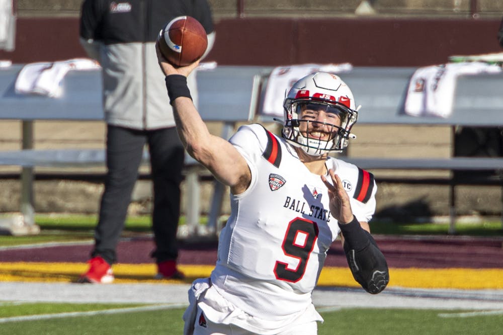 Ball State Cardinals redshirt senior quarterback Drew Plitt drops back for a pass in the first half of a game against the Central Michigan Chippewas Dec. 5, 2020, at Kelly/ Shorts Stadium in Mount Pleasant, Mich. The Cardinals beat the Chippewas 45-20. Jacob Musselman, DN