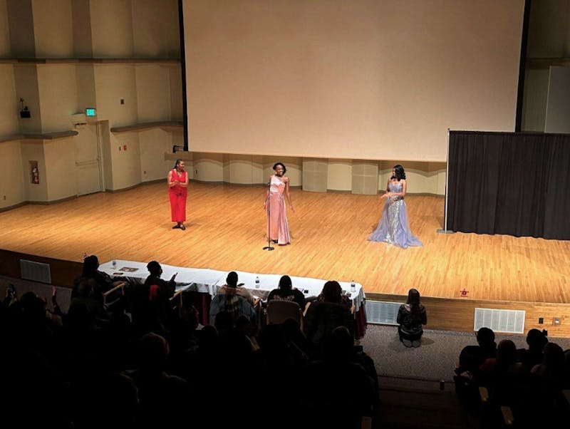 Anaiah Rice (left), Jasiah Scaife (middle) and Aiyana McKee (right) on stage at Pruis Hall at the Black Student's Association 56th Unity Pageant

Daniel Huber, NewsLink Indiana