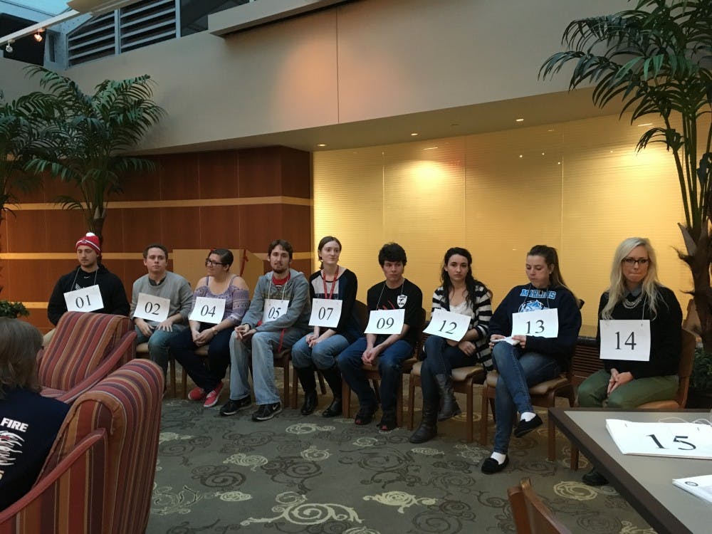 <p>Nine students met in the lobby of DeHority Complex for a spelling bee on a college campus. Cash prizes were offered to the first, second and third place winners, awarded at $100, $50 and $25. <em>DN PHOTO MICHELLE KAUFMAN</em></p>