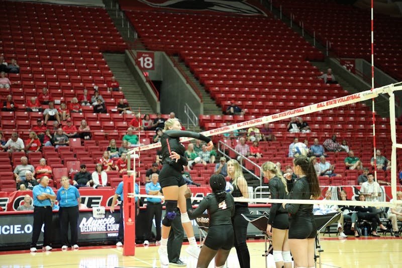 Senior middle blocker Sydnee VanBeek hits a ball during warmups for the Ball State Tournament Aug. 30, in Worthen Arena. The Cardinals defeated UAB, 3-0, and lost to USF, 3-2. Gabbi Glass, DN