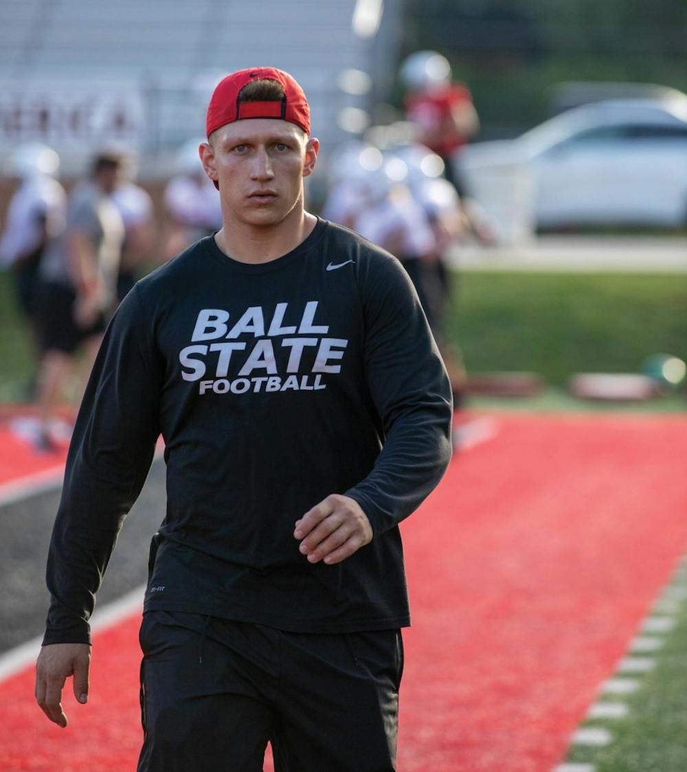 <p>Robert Schmidt, graduate assistant in strength and conditioning, prepares the field for practice Oct. 2, 2019, at Scheumann Stadium. Schmidt previously interned with South Carolina and Alabama as a strength and conditioning intern. <strong>Jacob Musselman, DN</strong></p>
