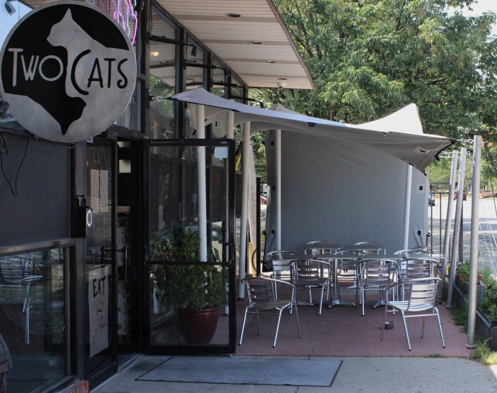 Two Cats adds alcohol, live music, new chef