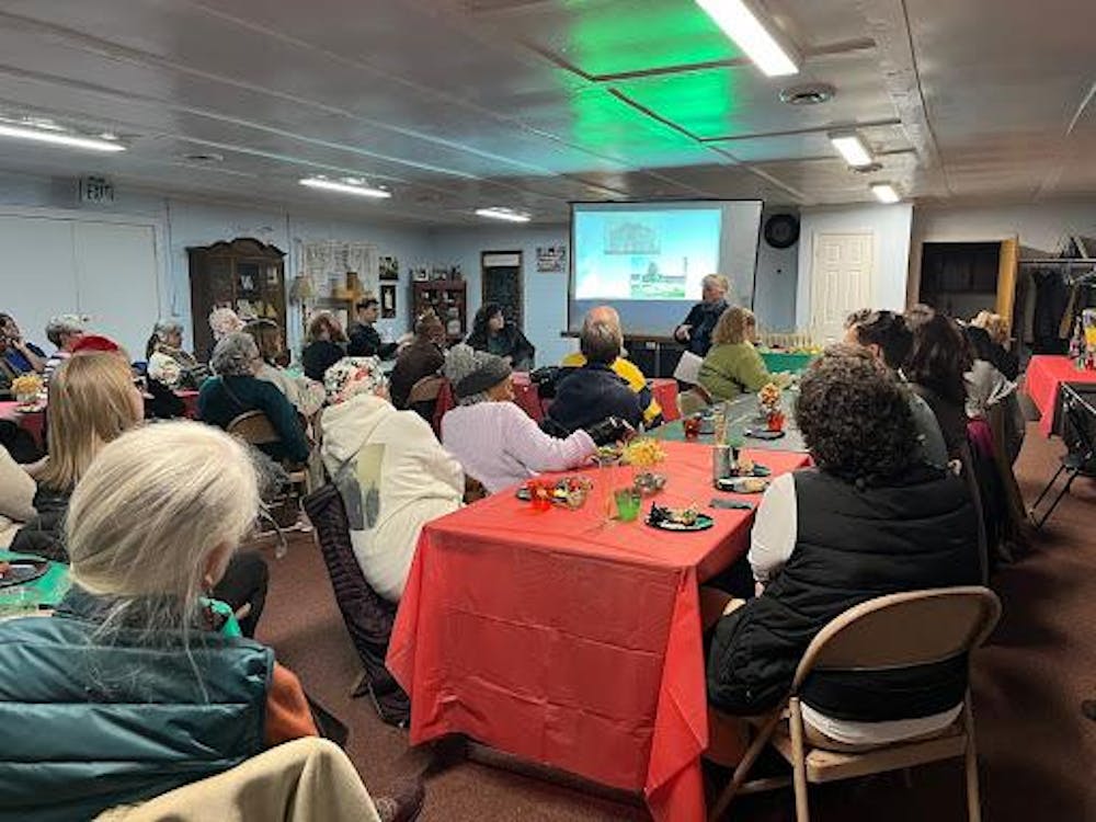 Panelists share photographs, articles and tell stories of the legacy left behind.