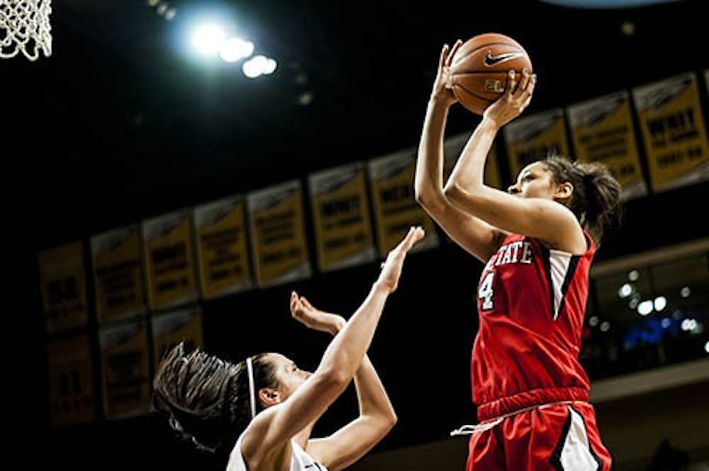 Freshman Nathalie Fontaine shoots over a Toledo player during the game on Feb. 10. Ball State women’s basketball officially ended the season with the loss to Kansas State on Thursday.  DN PHOTO JORDAN HUFFER