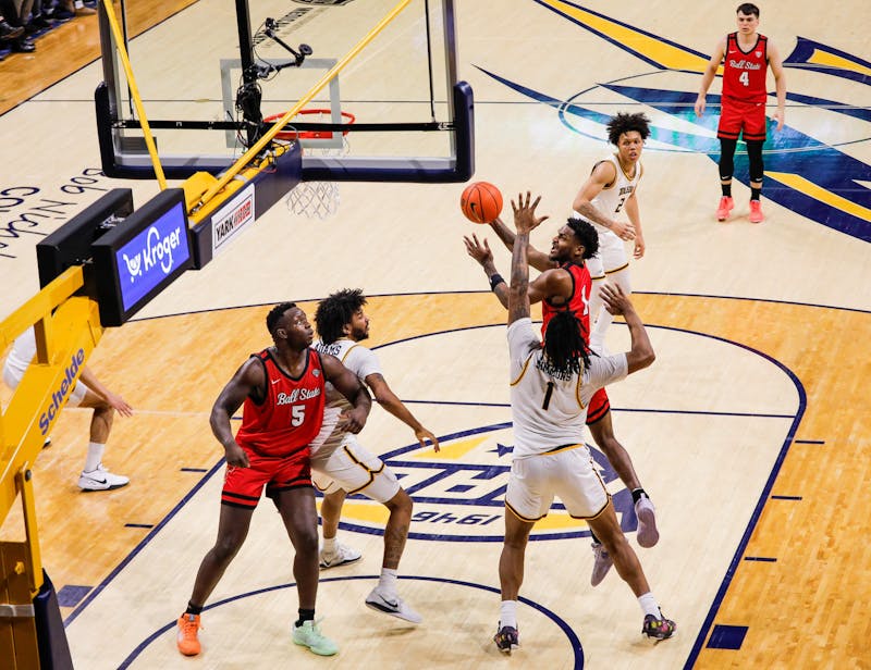 Ball State junior guard Jermarhi Hill puts the ball up for a last-second lay-up against Toledo Feb. 18 at John F. Savage Arena. The shot was called no good after a lengthy play review from the referees. Andrew Berger, DN 