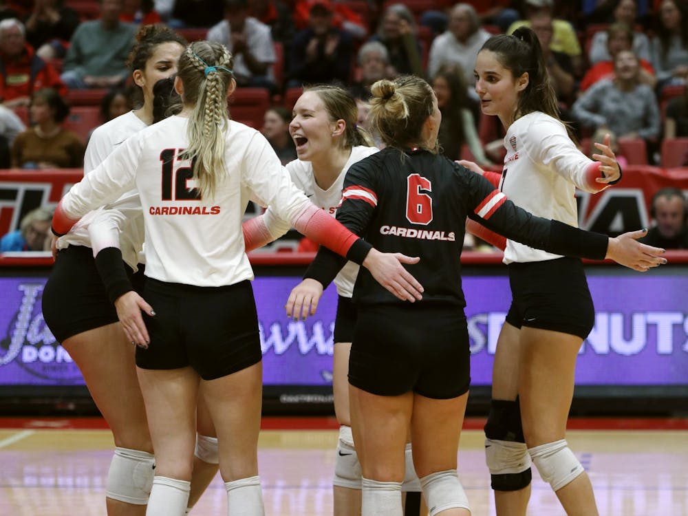 The Ball State Women's Volleyball team celebrates scoring a point in a game against Kent State Nov. 4 at Worthen Arena. Ball State earned MAC West Champions after sweeping Kent in their 13th straight win. Amber Pietz, DN