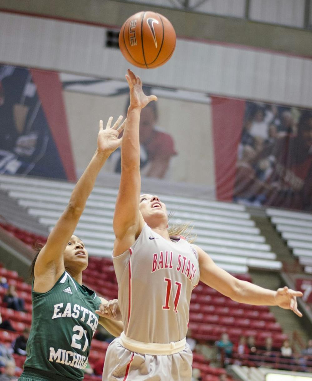 Senior guard Brandy Woody goes for a shot against Eastern Michigan on Feb. 23 at Worthen Arena. DN PHOTO BREANNA DAUGHERTY
