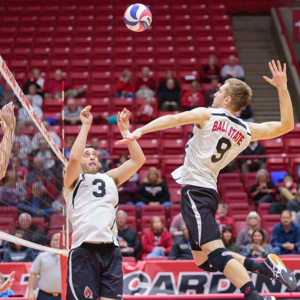 Senior setter Connor Gross sets the ball up for   sophomore middle attacker Parker Swartz during the game against Fort Wayne on Feb. 7 in Worthen Arena. The Cardinals won 3-0 against the Mastodons. Kyle Crawford // DN