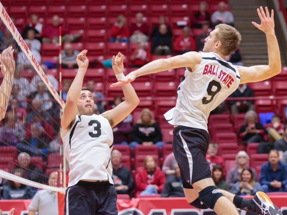 Senior setter Connor Gross sets the ball up for   sophomore middle attacker Parker Swartz during the game against Fort Wayne on Feb. 7 in Worthen Arena. The Cardinals won 3-0 against the Mastodons. Kyle Crawford // DN