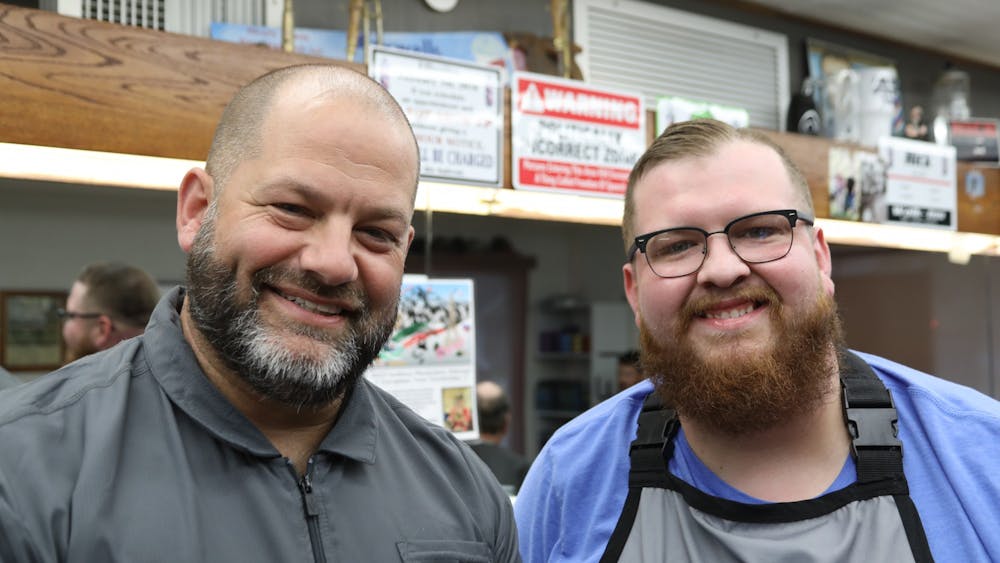 Portrait of Brian Richards (left) and Nick Richards (right), taken Aug. 18. Nick has worked at Maxwell’s for 4 years and has rallied a strong clientele for such a short time, Brian Richards says. Miguel Naranjo, DN