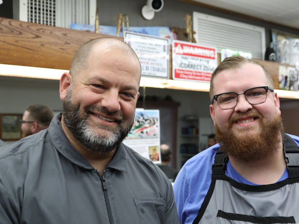 Portrait of Brian Richards (left) and Nick Richards (right), taken Aug. 18. Nick has worked at Maxwell’s for 4 years and has rallied a strong clientele for such a short time, Brian Richards says. Miguel Naranjo, DN