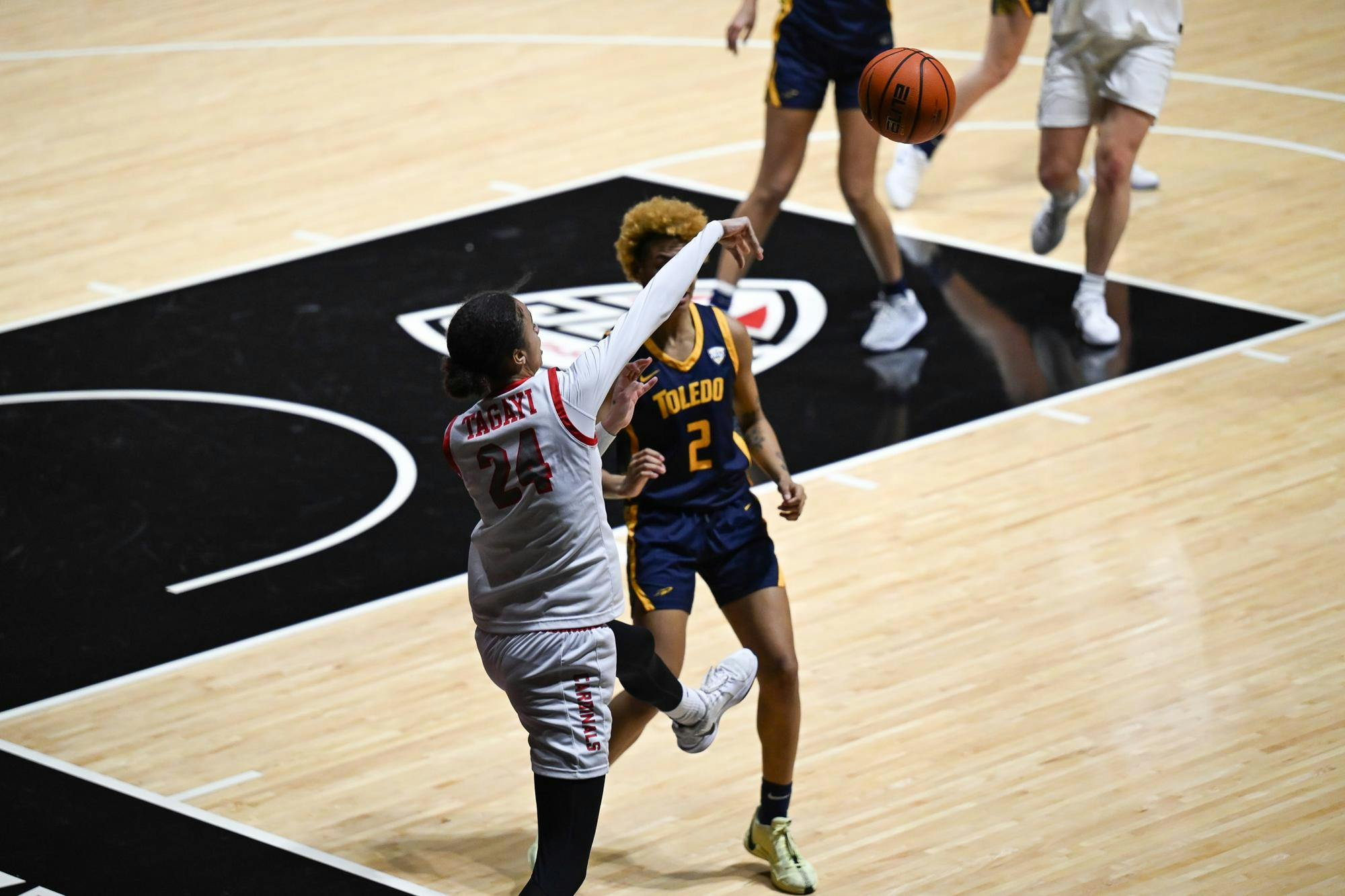 Freshman forward Aniss Tagayi attempts to keep the ball in play during the women's basketball match against the Toledo Rockets Jan. 7 at Worthen Arena. Ryan Fleek, DN