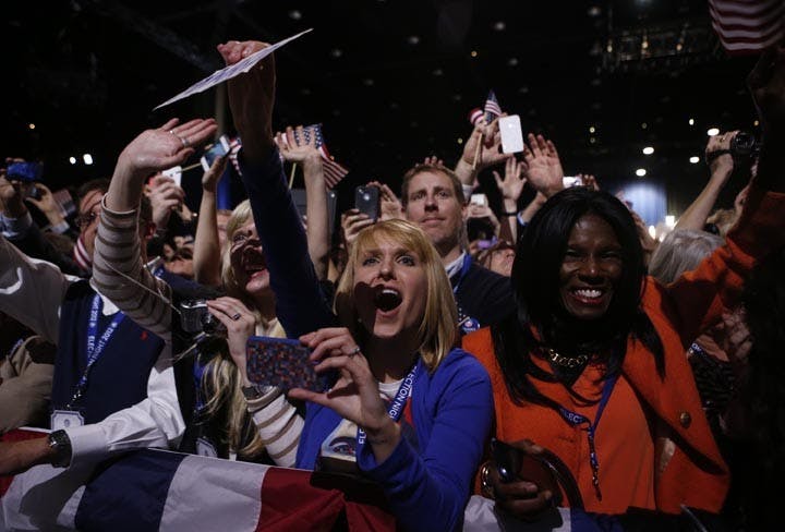 Supporters celebrate re-election at President Barack Obama's election-night headquarters on Wednesday, November 7, 2012, in Chicago, Illinois. (Brian Cassella/Chicago Tribune/MCT)