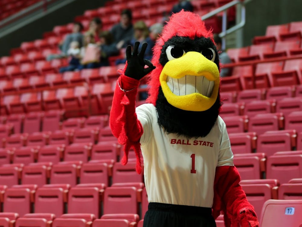 Charlie Cardinal chirps to fans before a Ball State women's volleyball game versus University of Toledo on Nov. 2 at John E. Worthen Arena. The game was the last home game of the season. Elliott DeRose, DN