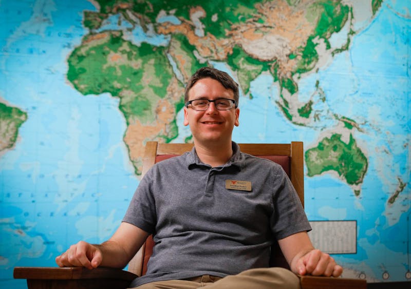 International student success coach Jonathan Hooker poses for a photo Sept. 16 at the Rinker Center for Global Affairs. The global affairs program aims to bridge cultural gaps by pairing international and domestic students. Andrew Berger, DN 
