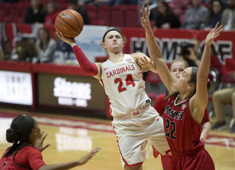 <p>Junior guard Jasmin Samz attempts a shot while being guarded by Northern Illinois’ Errin Hodges, left, and Abby Woollacott during the Cardinals’ game against the Huskies Jan. 27 in John E. Worthen Arena. <strong>Eric Pritchett, DN File</strong></p>