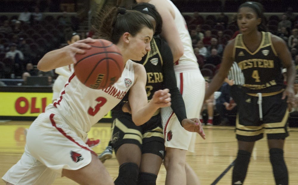 <p>Ball State junior guard Carmen Grande utilizes a screen to dribble around a Western Michigan defender in the quarterfinal round of the Mid-American Conference Tournament. <strong>Robby General, DN</strong></p>