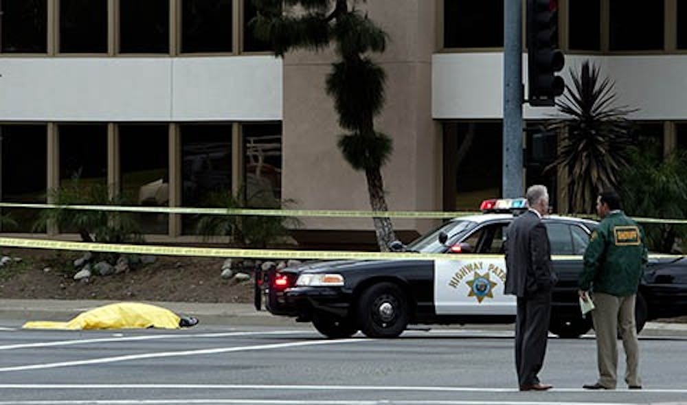 Orange County Sheriff’s officers investigate the scene where the alleged shooter turned the gun on himself on Feb. 19, 2013, in Villa Park, Calif. The gunman opened fire on a home and vehicles on a Southern California freeway Tuesday afternoon. MCT PHOTO