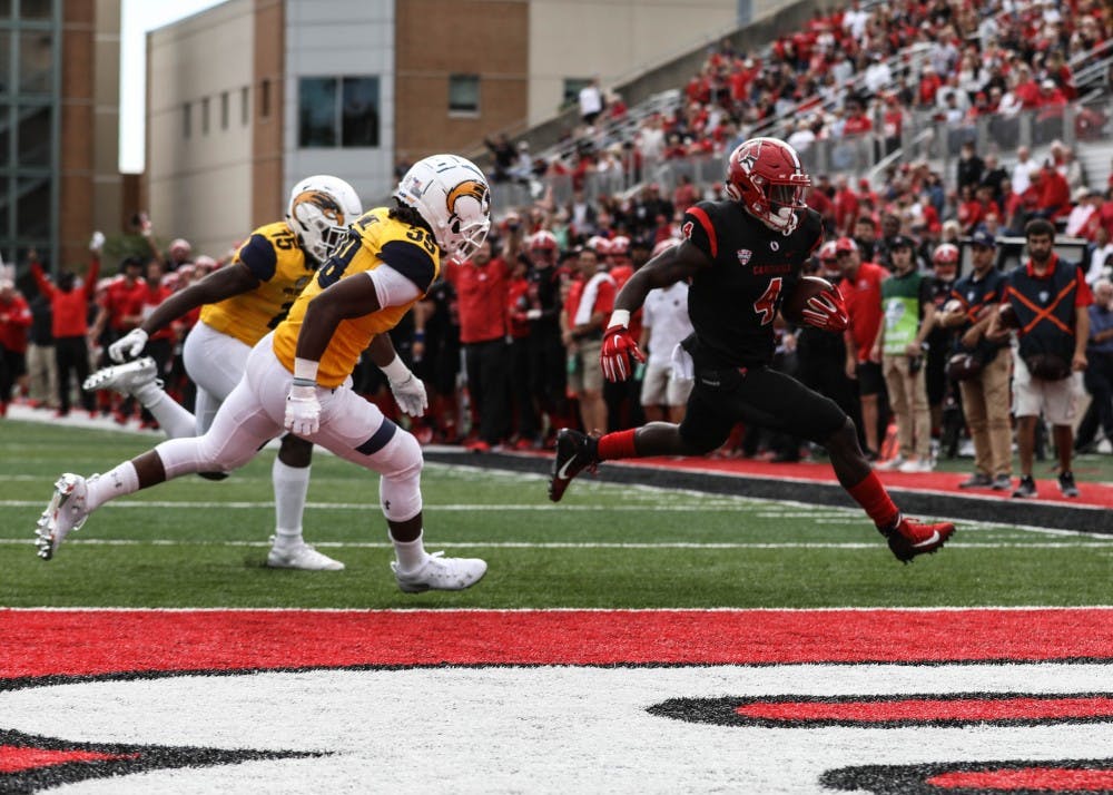 Junior running back Malik Dunner scores a touchdown during the game against Kent State Saturday, Sept 28, 2018, at Scheumann Stadium. Dunner scored the first touchdown of the game. Rebecca Slezak,DN