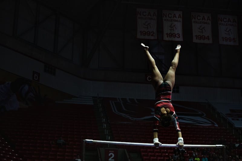 Graduate student Jordyn Penny spins on the high bar while performing against Western Michigan Feb. 3, 2019, at Worthen Arena. The Ball State women's gymnastics team hosted West Michigan Feb. 3, 2019, at Worthen Arena. Ball State defeated the Broncos 194 - 193. Madeline Grosh,DN