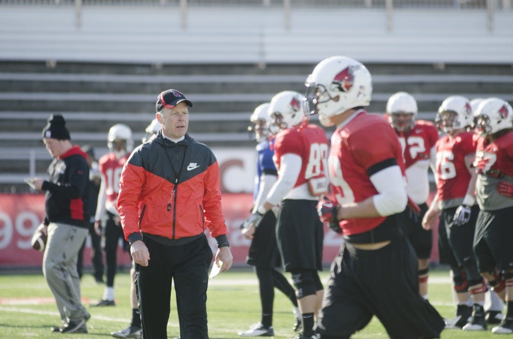 Kevin Kelley coaches during a spring practice. Kelley was hired as the defensive coordinator in January. DN PHOTO BREANA DAUGHERTY 