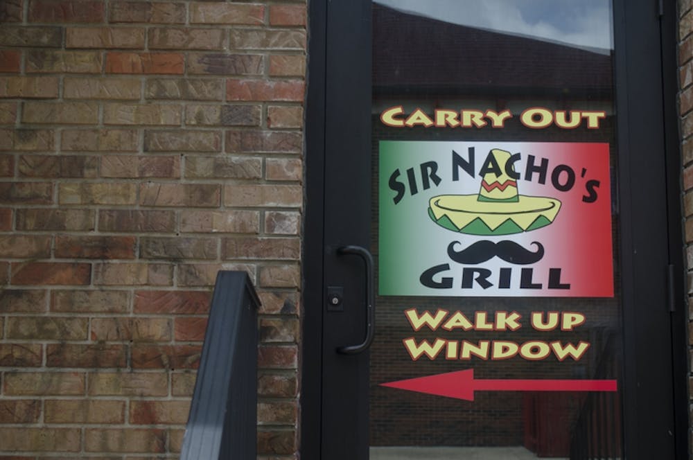 <p><strong>Sir Nacho's Grill </strong>is located in Cleo's Bourbon Bar in The Village. Sir Nacho's will soon take over Cleo's to become Three Amigos where the owners hope to sell to-go margaritas. <em>DN FILE PHOTO BREANNA DAUGHERTY</em></p>