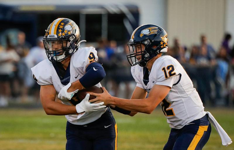 Delta football falls to Greenfield-Central in final home game of ...