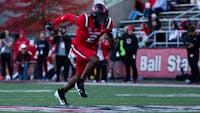 Junior wide receiver Justin Bowick runs against Northern Illinois Oct. 26 at Scheumann Stadium. Bowick had three receptions in the game. Jayce Blane, DN