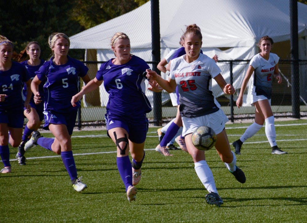 Sophomore defender Yela Ziswiler kicks the ball away from Western Illinois Sept. 15 at Briner Sports Complex. The Cardinals won 3-0. Harrison Raft, DN