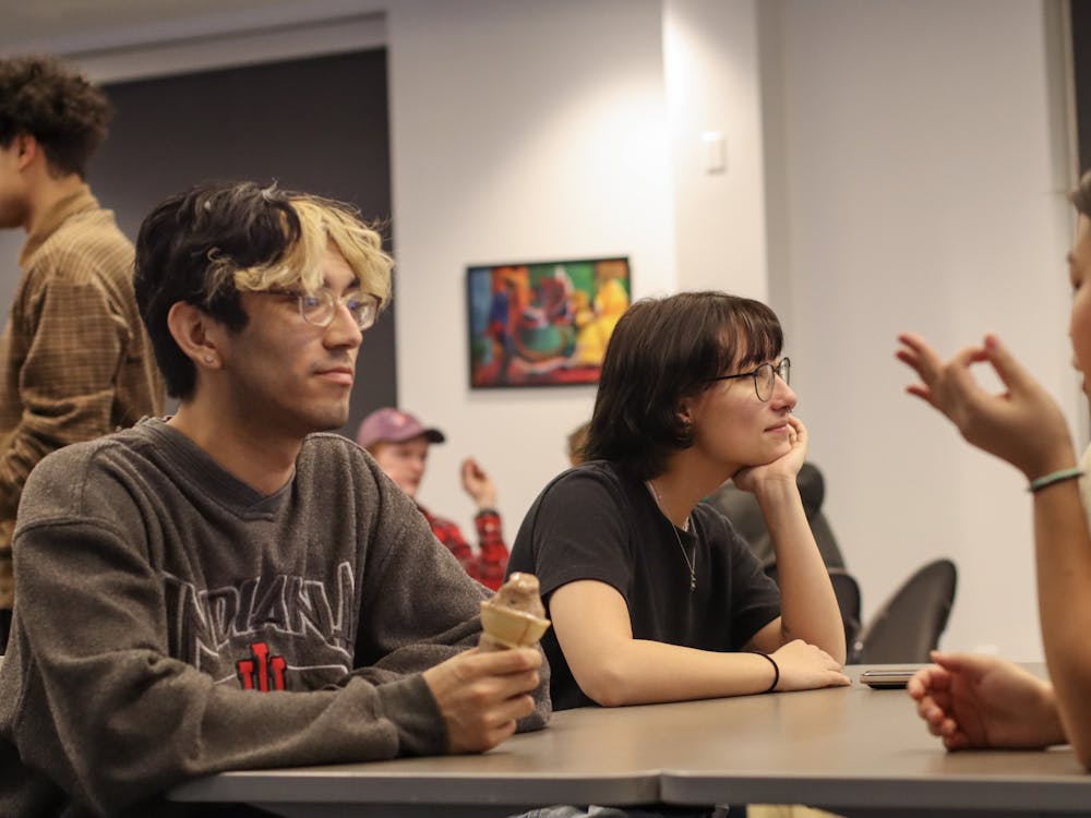 Asian Student Union attendees engage in conversation at the Asian Student Union meeting Feb. 6 in the Multicultural Center. Christian Avila, first-year Ball State English education major, said having a support system has helped him cope with the negative aspects that come with being Asian-American at Ball State. Maya Kim, DN