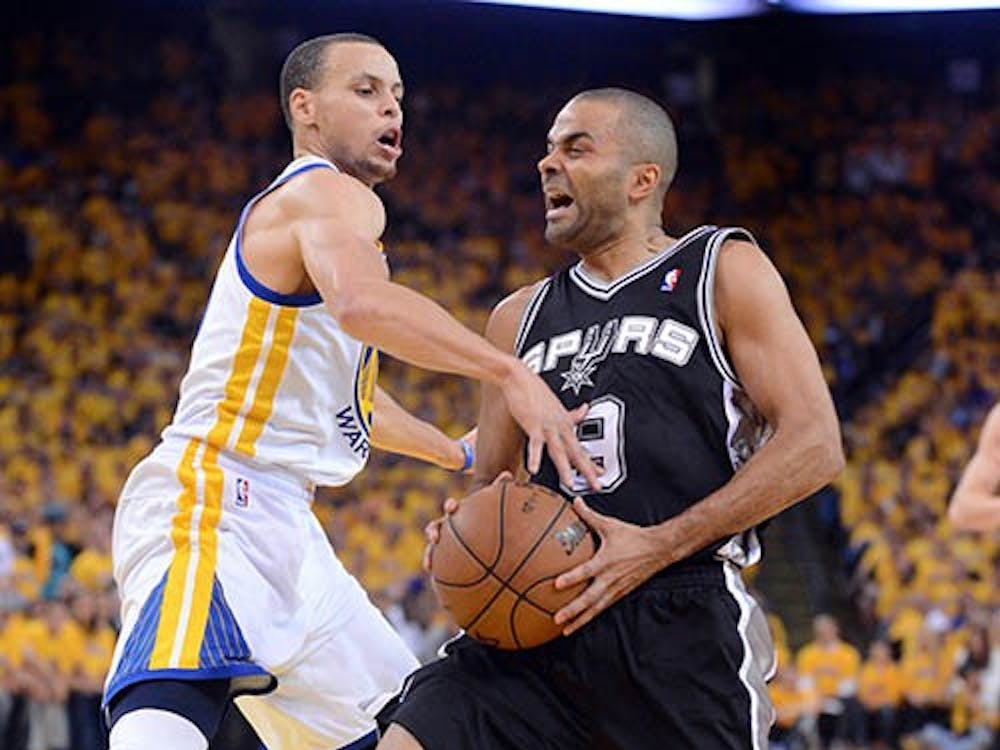 The San Antonio Spurs’ Tony Parker drives against the Golden State Warriors’ Stephen Curry in game three of the Western Conference semifinals on Friday at Oracle Arena in Oakland, Calif. MCT PHOTO 