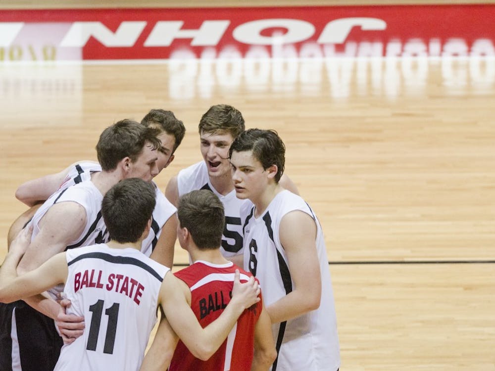 Membmer of the men's volleyball team huddle before a play during the match against Harvard on Jan. 15 at Worthen Arena. DN PHOTO BREANNA DAUGHERTY