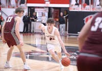 Wapahani junior Camden Bell dribbles Dec. 20 against Wes-Del at Wapahani High School. Bell led the Raiders with 24 points. Zach Carter, DN.