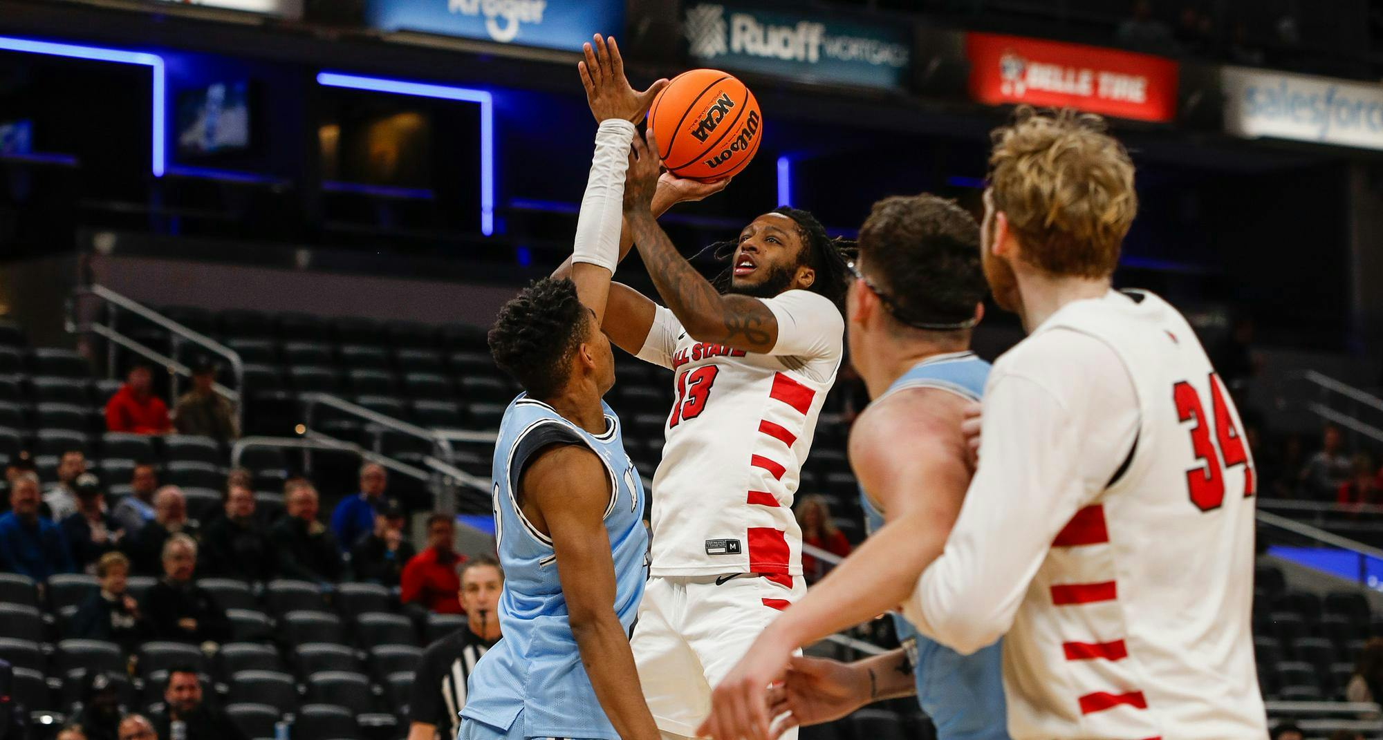 Freshman guard Trent Middleton Jr. takes a shot while under pressure Dec. 16 against Indiana State at Gainbridge Fieldhouse. Middleton made 3 field goals. Andrew Berger, DN