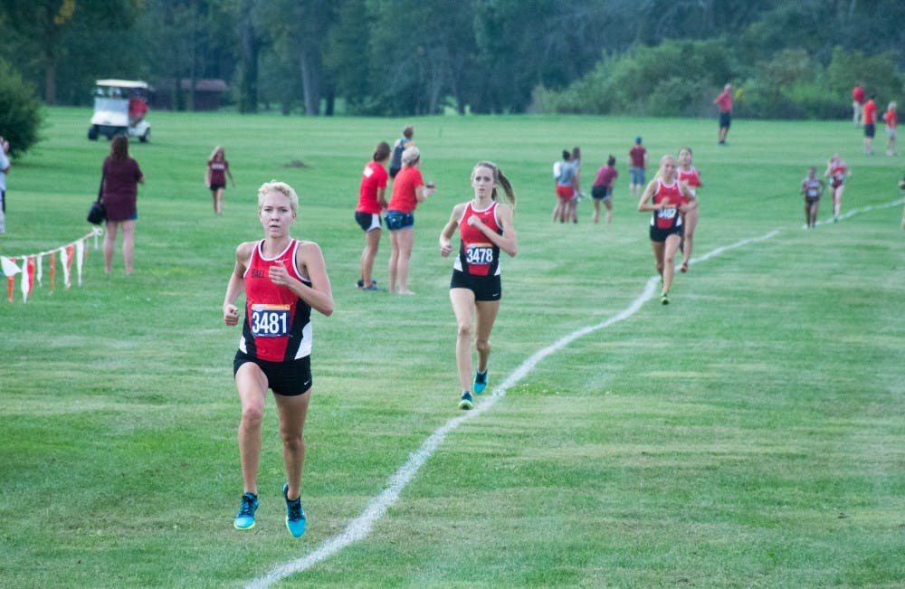 Emily Tromp finishes the race in first place at the cross country meet against IUPUI on Sept. 23, 2016 at the Muncie Elks Country Club.  Ball State won against IUPUI 16-46. Kaiti Sullivan // DN
