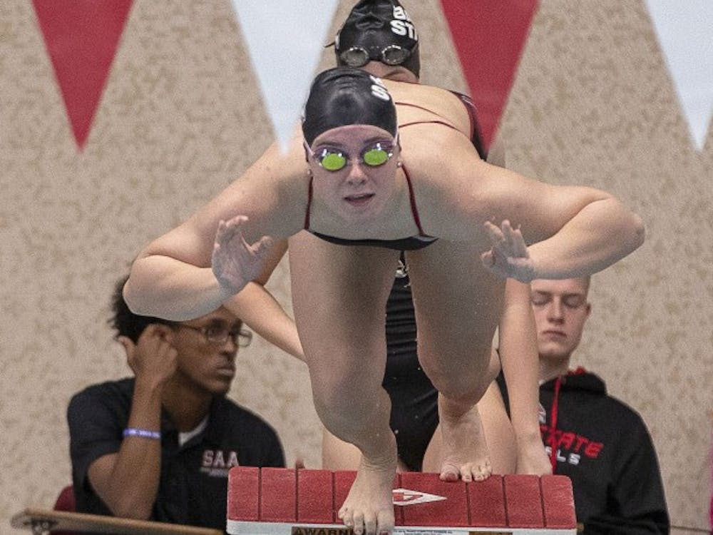 A Ball State swimmer launches off the starting block at the women's swim meet Saturday Nov. 3, at Lewellen Aquatic Center. The Cardinals competed against the University of Akron. Jacob Haberstroh,DN.