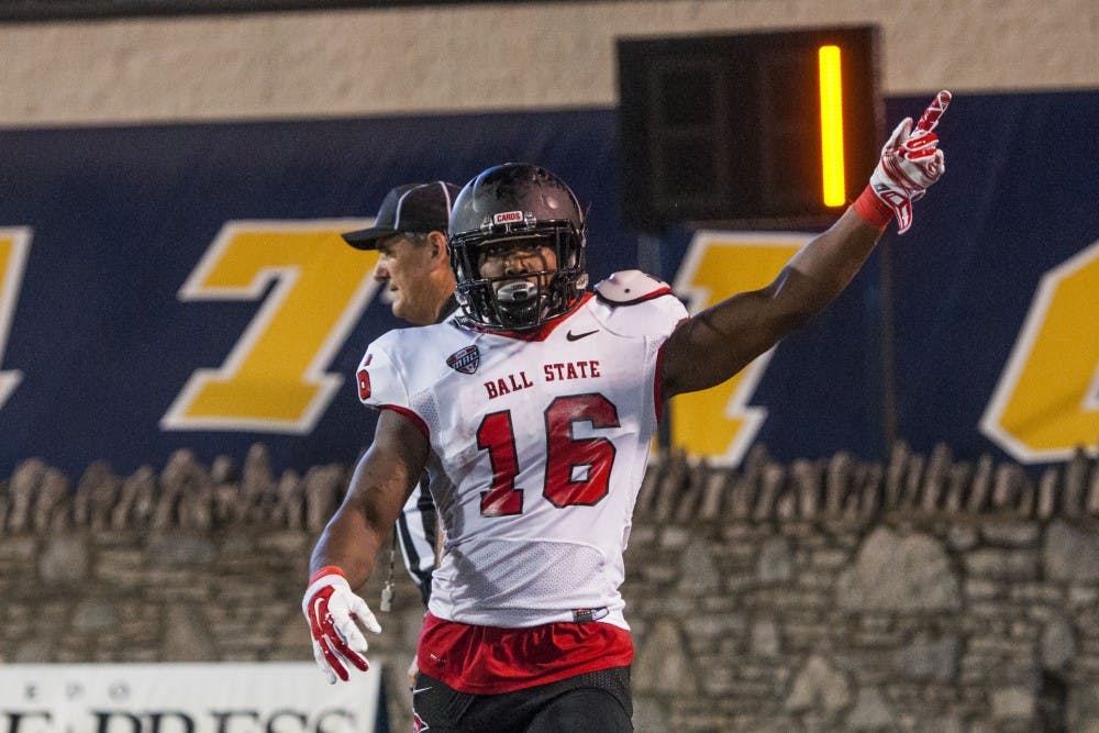 Junior wide receiver KeVonn Mabon celebrates his touchdown against Toledo at the Glass Bowl on Sept. 20. DN PHOTO JONATHAN MIKSANEK