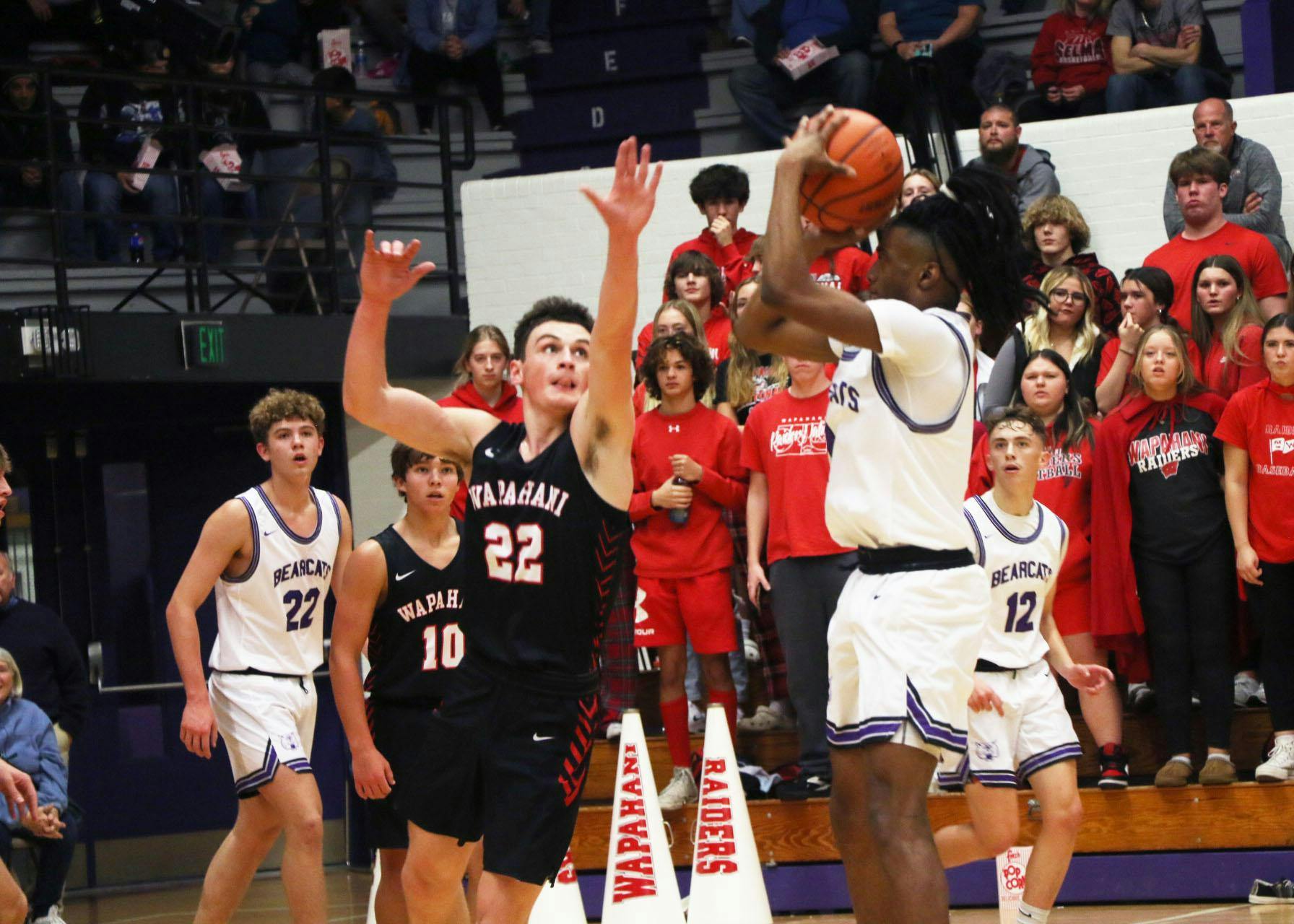 Wapahani sophomore Camden Bell tries to blacok a shot Nov. 21 against Muncie Central at the Muncie Central Fieldhouse. Zach Carter, DN.